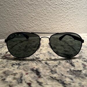 Black Ray-Ban aviator sunglasses